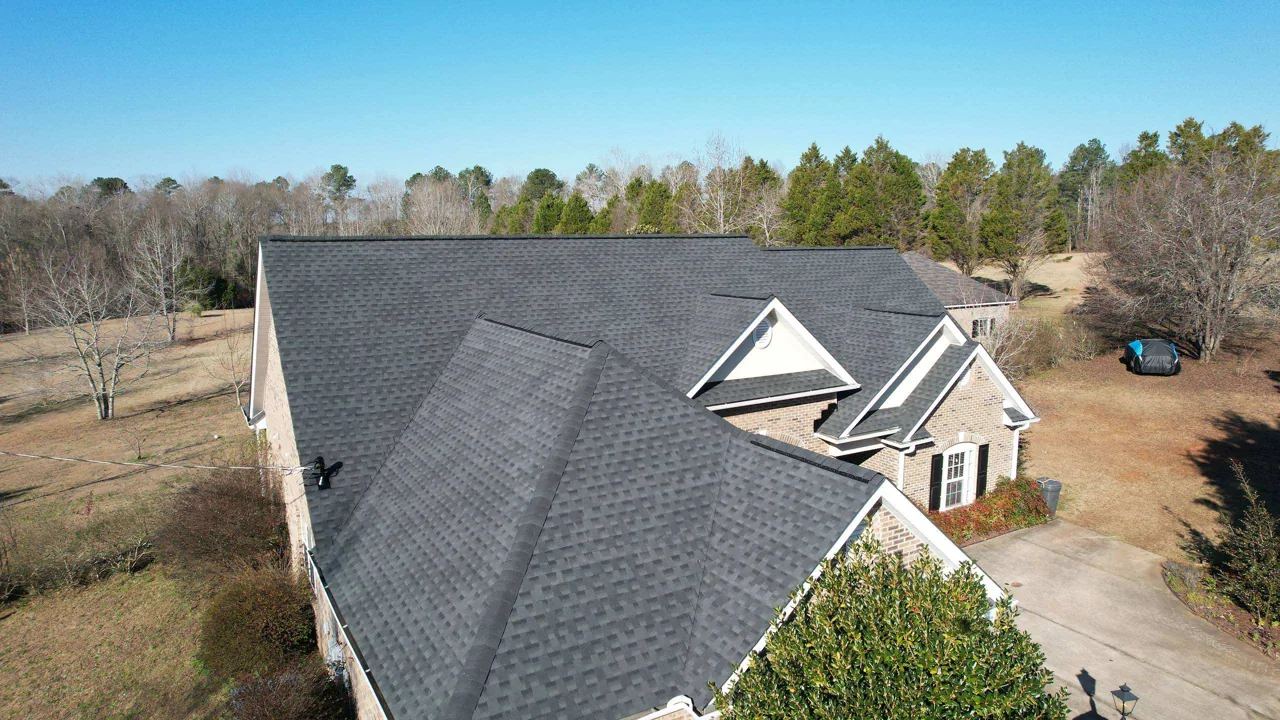 A different view of the same completed roof, showing the connected slopes.