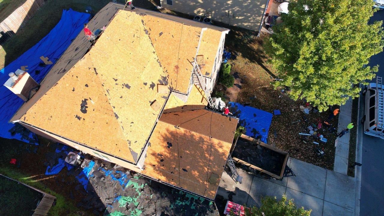 Exposed roof decking during work on a two-story home.