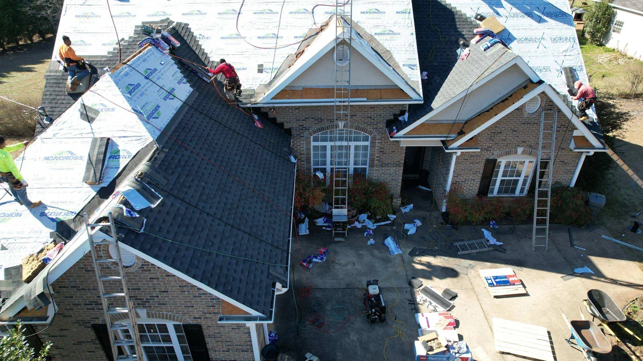 Installation in progress on the same multigable brick home